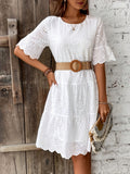 Embroidered Dress with a Hollowed-Out Lining in a Pure Color.
