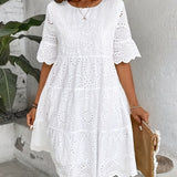 Embroidered Dress with a Hollowed-Out Lining in a Pure Color.