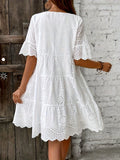 Embroidered Dress with a Hollowed-Out Lining in a Pure Color.