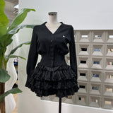 Amazon fishbone slim sling + cake girl anti-exposure skirt + knitted waist V-neck cardigan 3-piece set