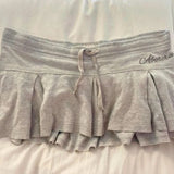 American Fashion High Street Thin Casual Skirts Y2k Aesthetic Lace Up Waist Letter Print Pleated Jupe Harajuku All Match Skirts