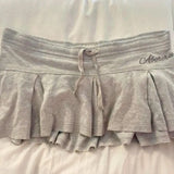 American Fashion High Street Thin Casual Skirts Y2k Aesthetic Lace Up Waist Letter Print Pleated Jupe Harajuku All Match Skirts