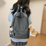 Pbong  Unisex Solid Black Backpacks Large Capacity Waterproof Leisure Or Travel Bags Simple Nylon Light School Bags For Boys Or Girls