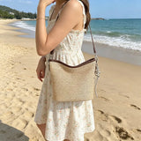 Pbong  Women Summer Straw Crossbody Purse with PU Adjustable Strap Travel Bucket Bag for Beach Vacation Travel