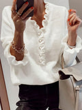 Ladies' autumn and winter fashionable solid color V-neck long sleeved knitted sweater