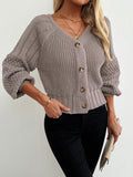 Knitted cardigan with raglan sleeve texture