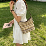 Pbong  Women Summer Straw Crossbody Purse with PU Adjustable Strap Travel Bucket Bag for Beach Vacation Travel