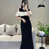 Pbong  High-end French Elegant Dress Niche Design Black and White Contrasting Off-shoulder Slim Fish Tail Commuting Dress for Women