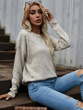 Autumn and winter pure color simple round neck long sleeved women's knitted sweater